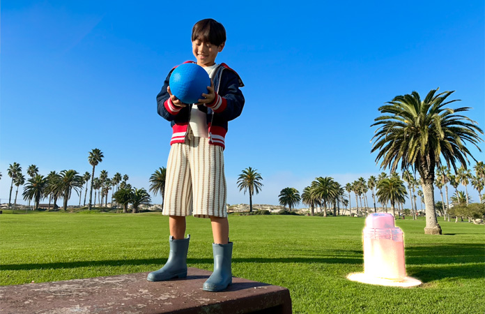 De Ruim Op-tool wordt gebruikt om een vuilnisbak uit de achtergrond van een foto te verwijderen