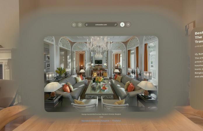 Safari web page featuring an inline spatial scene of a living room with long, deep hallways in the background