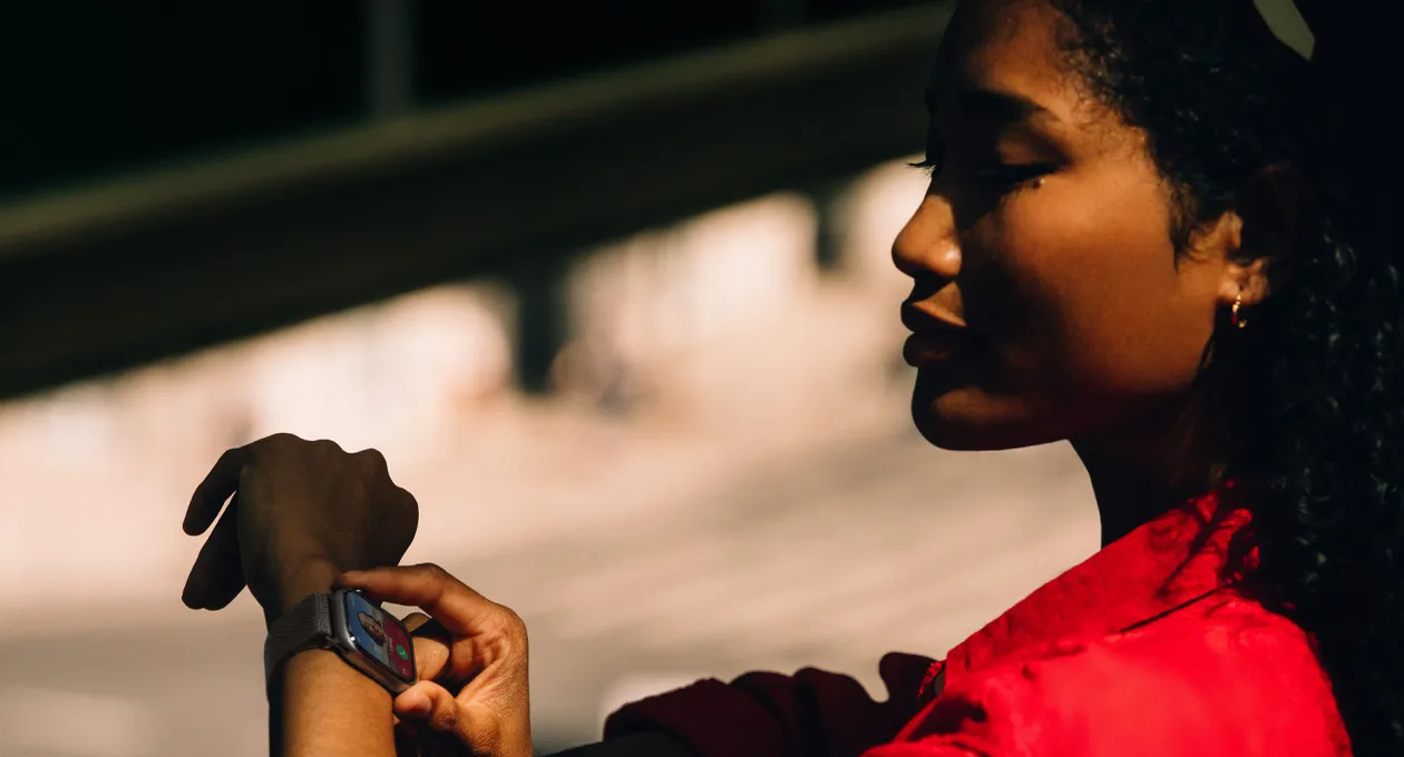 A person reads conversation in Messages on their Apple Watch Series 11