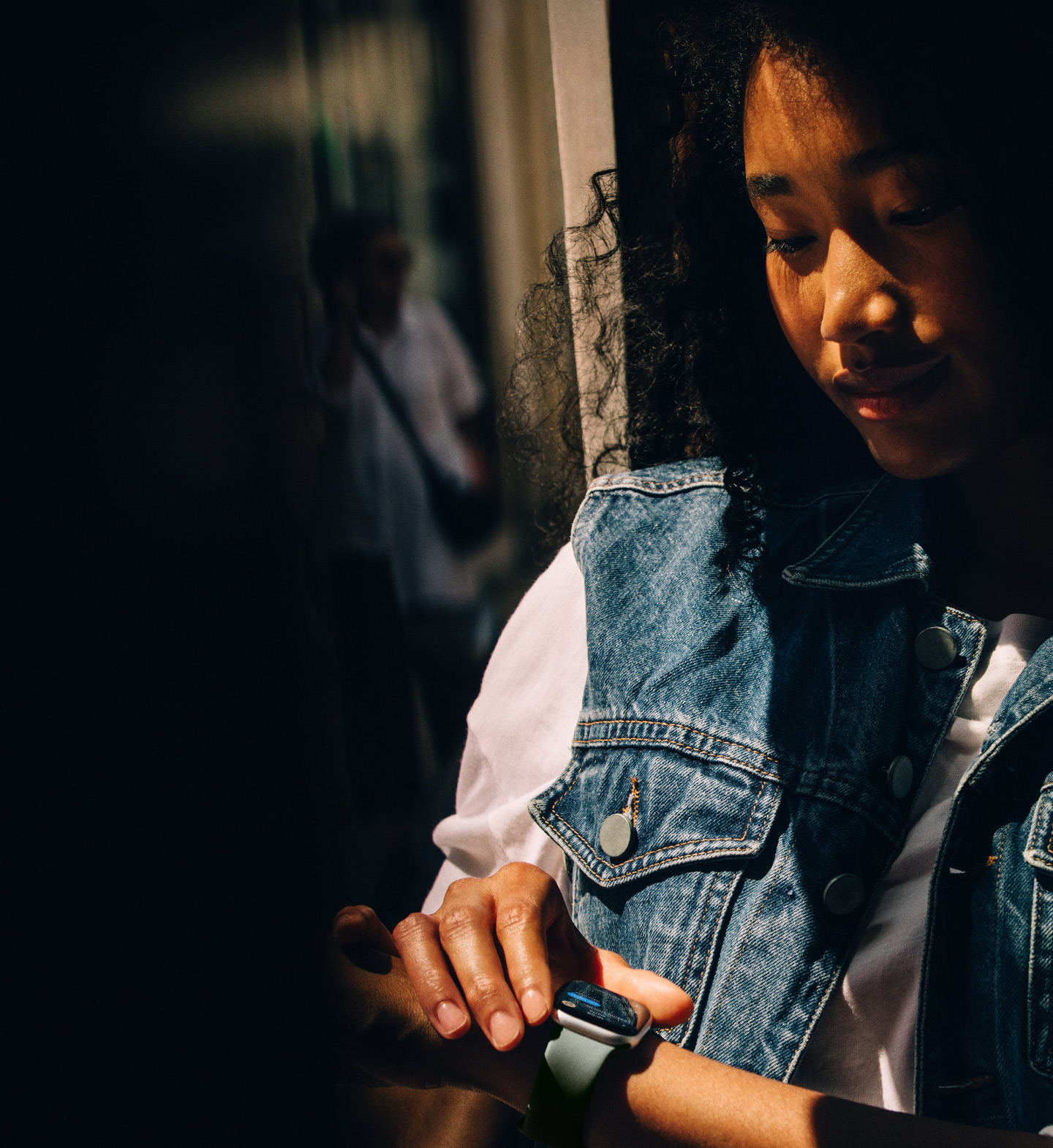 A person checks Messages on Apple Watch Series 11