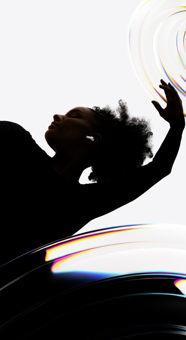 AirPods Pro 3 inserted in the ear of a dancer as they enjoy a hands-free listening experience