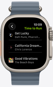 Apple Watch screen featuring a Fitness+ playlist including songs by The Weeknd, Skrillex, Justin Bieber, and Shawn Mendes