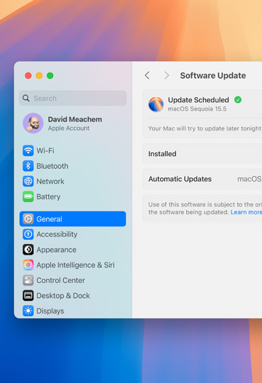 Mac screen shows a scheduled software update within System Settings