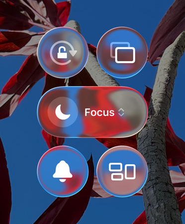 Colorful iPhone Home Screen showing transparent Liquid Glass, apps and widgets
