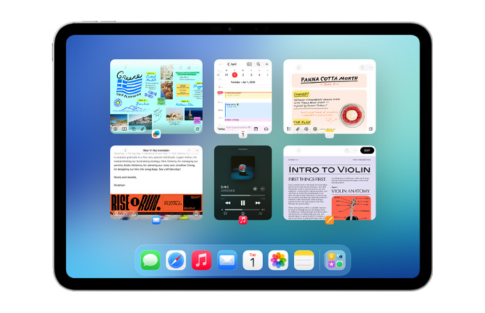 iPad, fekvő tájolás, a képernyőn hat ablak látszik két sorban, köztük a Naptár, a Jegyzetek, az Apple Music és a Safari appok
